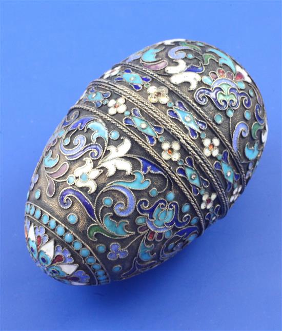 An early 20th century Russian silver and polychrome cloisonne enamel egg shaped box, 2.5in.